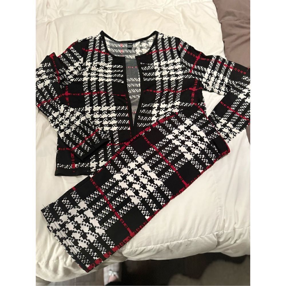 Two piece plaid open front jacket, casual contrast, trim. Pull on skirt with str